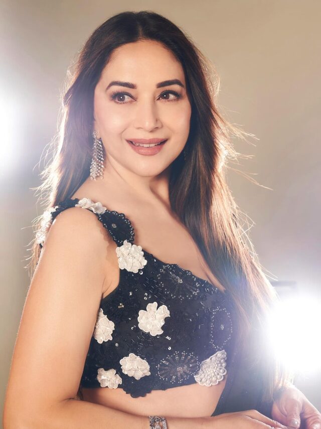 Madhuri Dixit draped in a mesmerizing black sequin saree